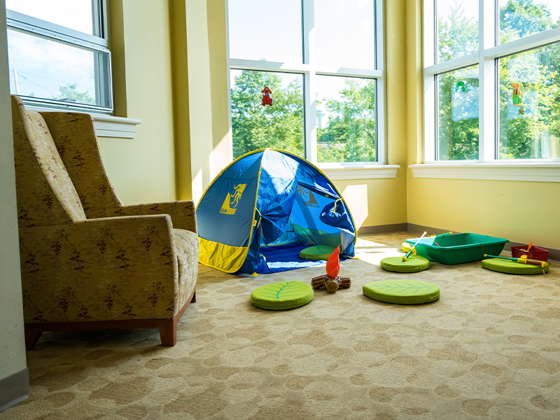 Small child-sized tent within the Children's Department of the library.